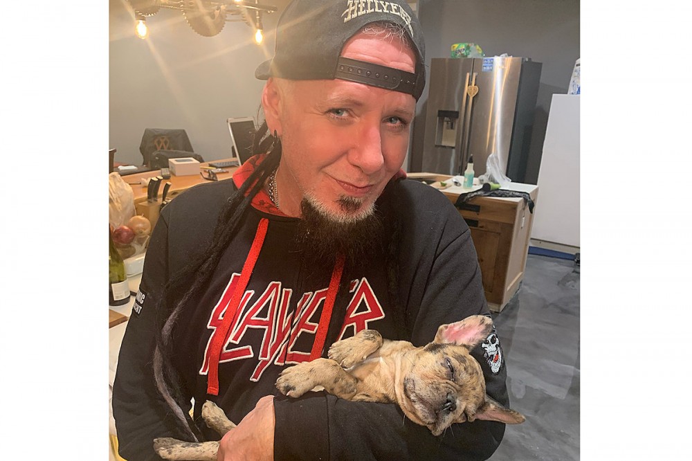 49 Rock + Metal Artists Pose With Their Pets for National Pet Day