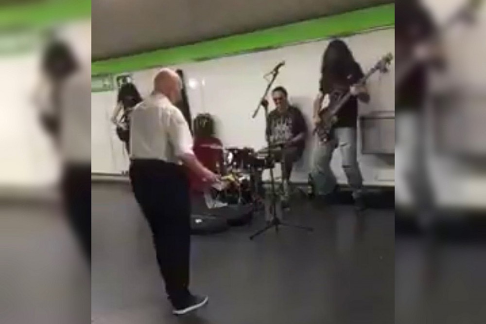Man Really Cutting a Rug to Metallica Cover Band at Subway Station