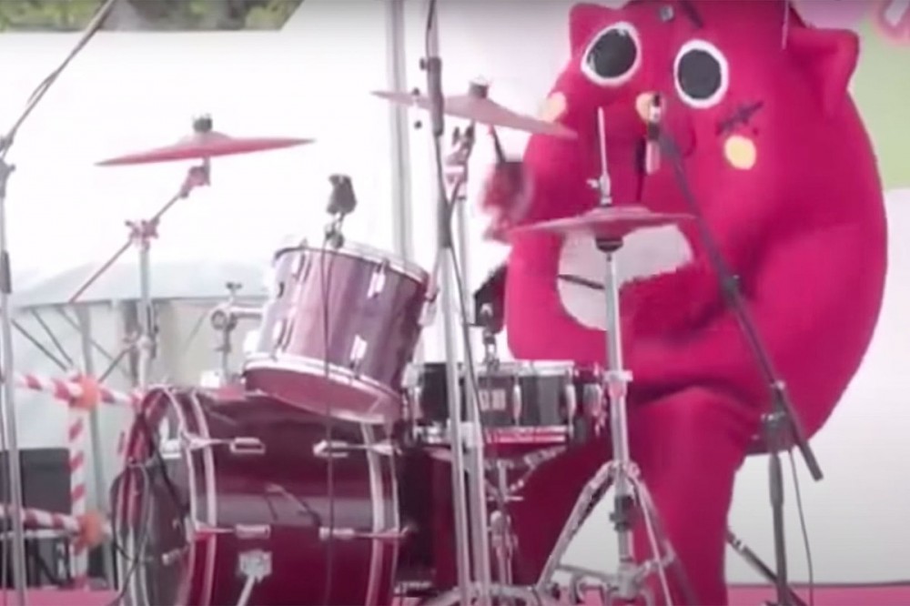 Drummer in Animal Costume Can’t Help But Bring the Fury During Children’s Music Concert
