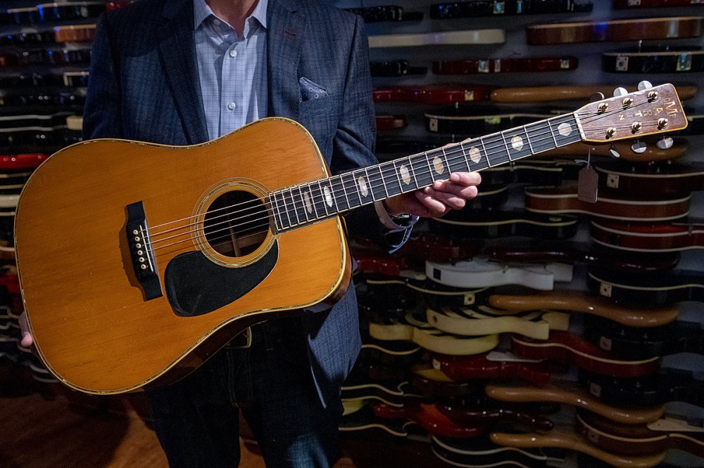 Eric Clapton’s 1960s Acoustic Guitar Sells for $625,000 at Auction