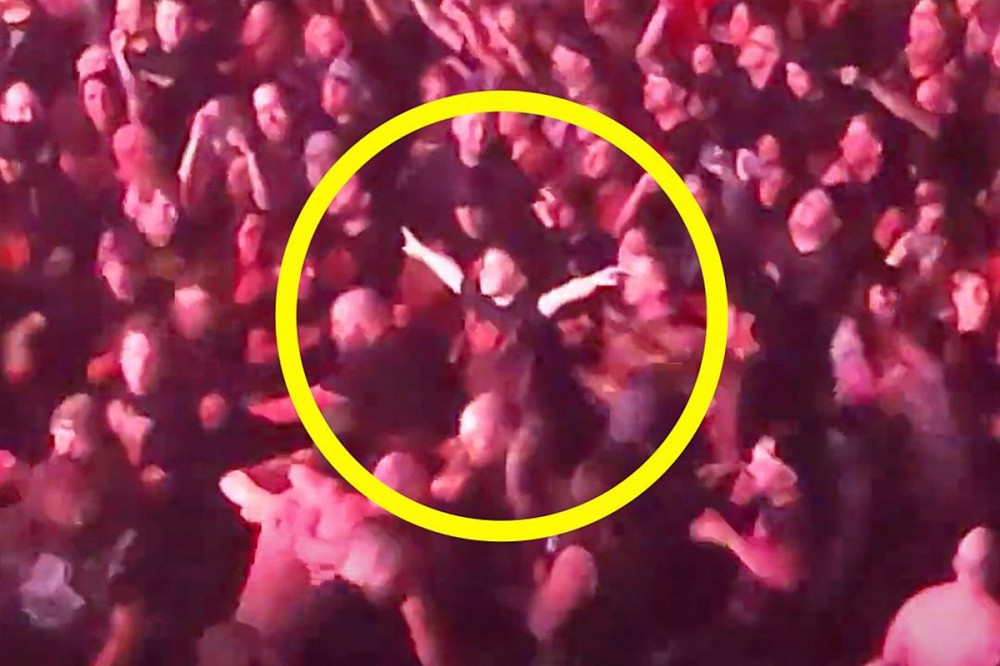 Slipknot Circle Pit Forms Around Young Kid Rocking From Dad’s Shoulders
