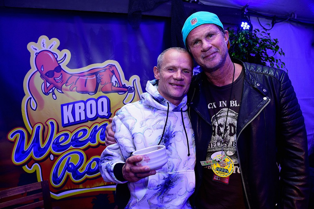 Red Hot Chili Peppers’ Flea Reveals He + Chad Smith Surprisingly Don’t Hang Out Very Often